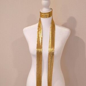 Bohemian gold tone metal mash tie,or belt, about 60" long.